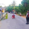 Polsek Buru Perkuat Pengaturan Lalu Lintas Pagi, Antisipasi Kemacetan di Depan Sekolah