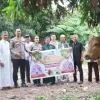 Polres Karimun Salurkan Sapi Kurban Kapolda Kepri dan Kapolres untuk Warga