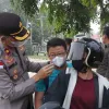 Polres Karimun Bagikan Masker untuk Antisipasi Dampak Kabut Asap.